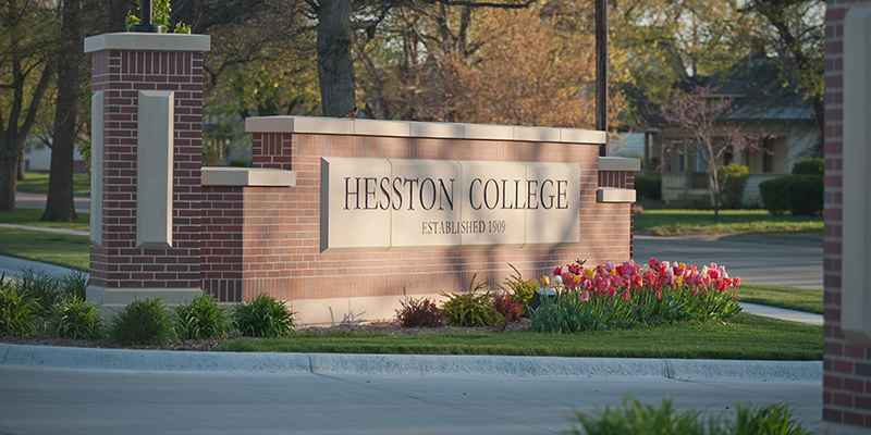 hesston college sign with tulips