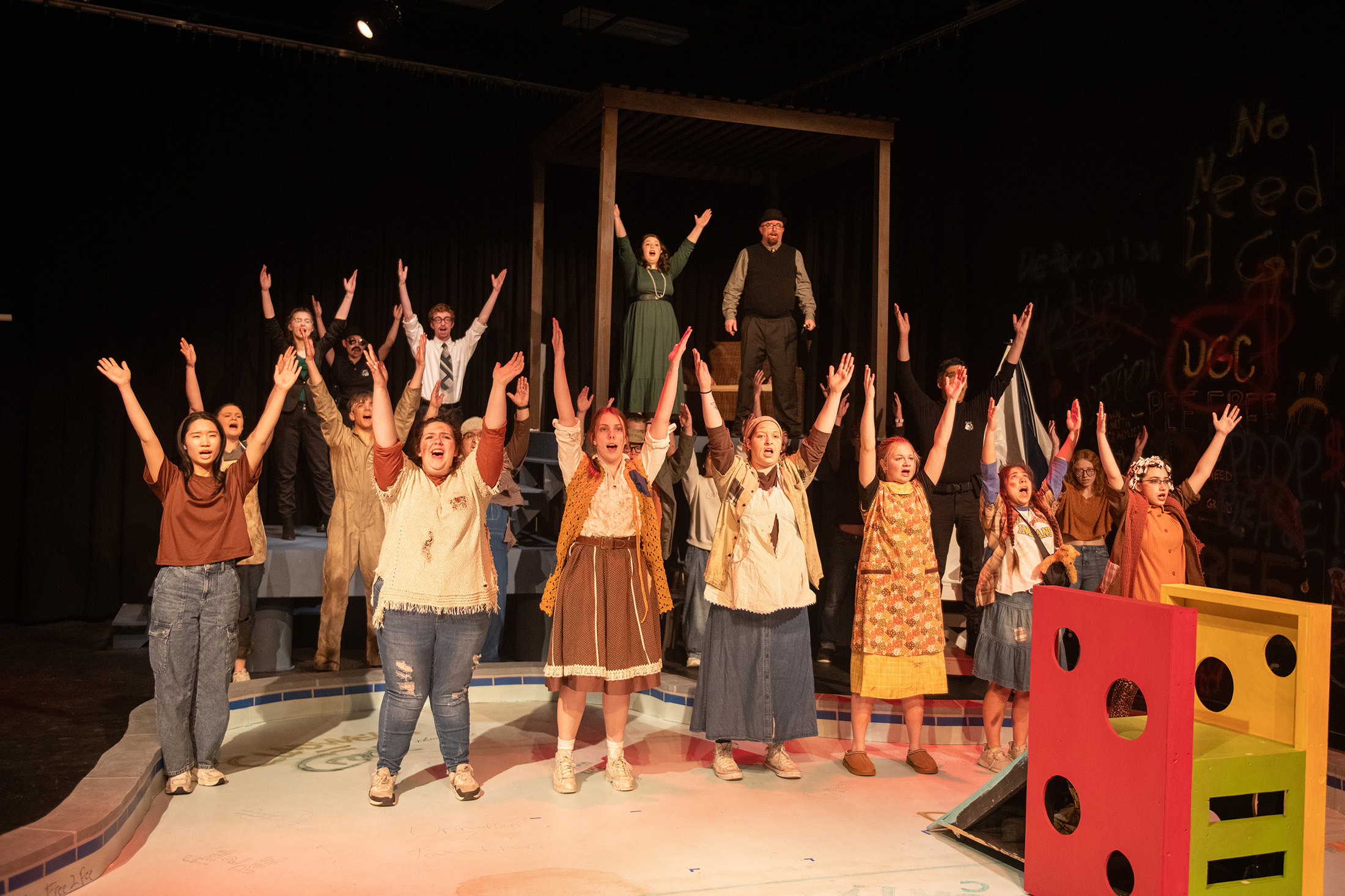 The whole cast sings a song from Urinetown