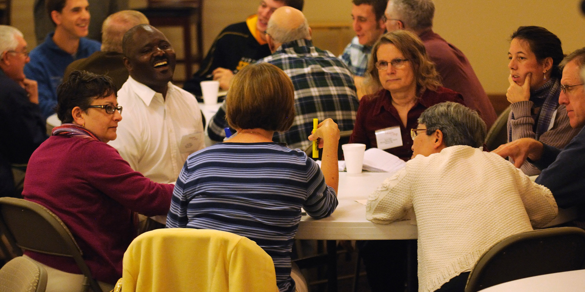 photo - Participants at Hesston College’s Anabaptist Discipleship and Vision Series conference discuss ways to be more inclusive during a breakout session.