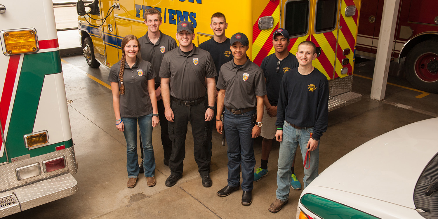 photo - Hesston College students work for Hesston Emergency Services: Beth Schurz (Phillipsburg, Kan.), Clay Axness (Glendale, Ariz.), Jared Wedel (Peabody, Kan.), Lane Schrock (Parnell, Iowa), Isaiah Crosby (Ponca City, Okla.), Jonathan Gonzalez (Goshen, Ind.) and Zach Stauffer (Belleville, Pa.).