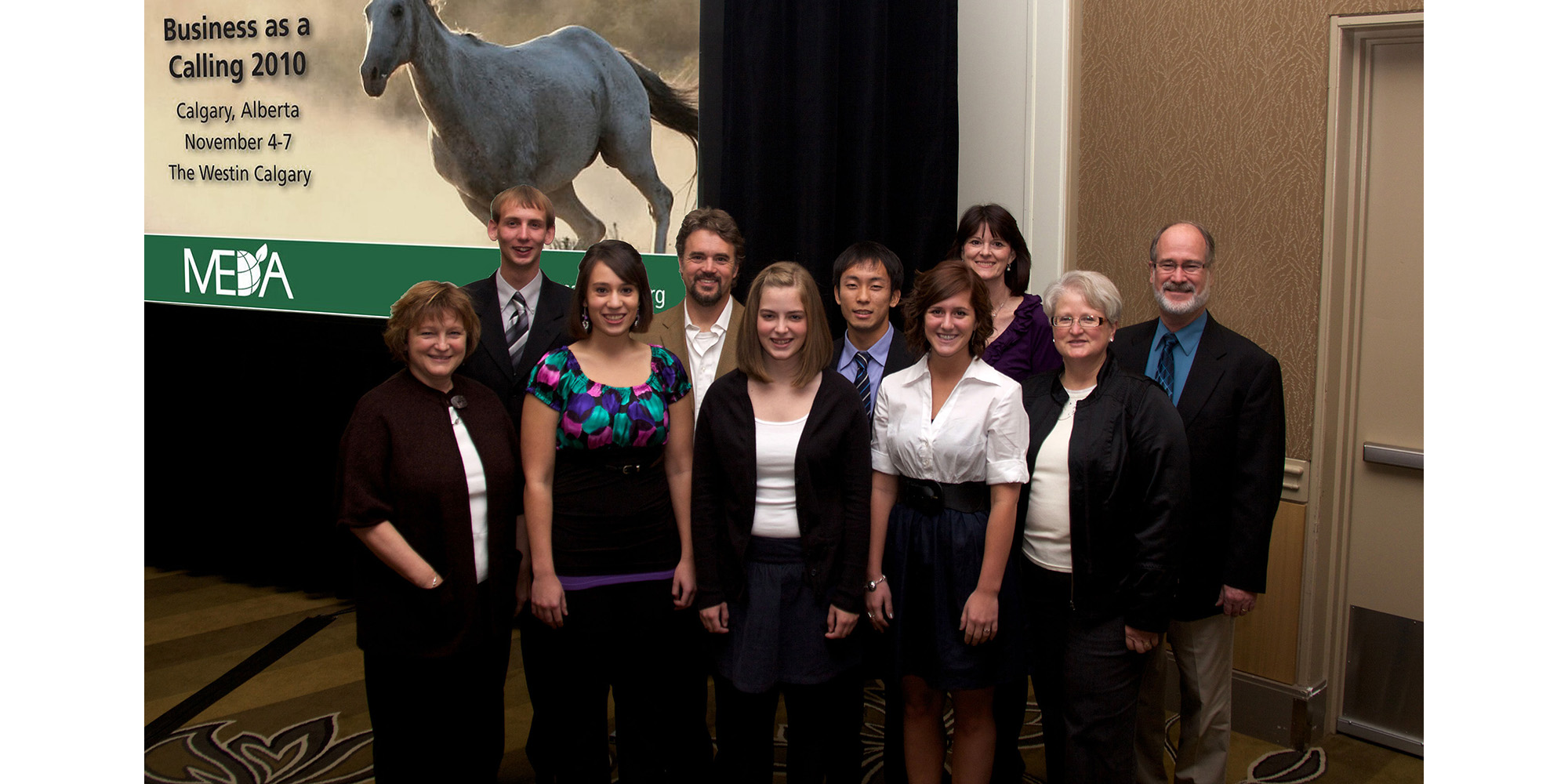 photo - Several members of the Hesston College community, including five sophomore business students and two instructors traveled to Calgary, Alberta, Canada Nov. 4 to 7 for the 2010 Mennonite Economic Development Associates (MEDA) convention. “MEDA was such a good experience,” said student Sarah Lederman. “We were able to talk with Mennonite business professionals and learn how they have brought their faith into their businesses.” Pictured from left are Hesston College Vice President of Advancement Yvonne Sieber; John Oyer, Hesston, Kan.; Luci Eash, Haven, Kan.; instructor David LeVan; Laura Unruh, Newton, Kan.; Masaki Kato, Tokyo, Japan; Sarah Lederman, Middlebury, Ind.; instructor Vickie Andres; and Hesston College volunteers Sid and Peg Burkey, Milford, Neb.