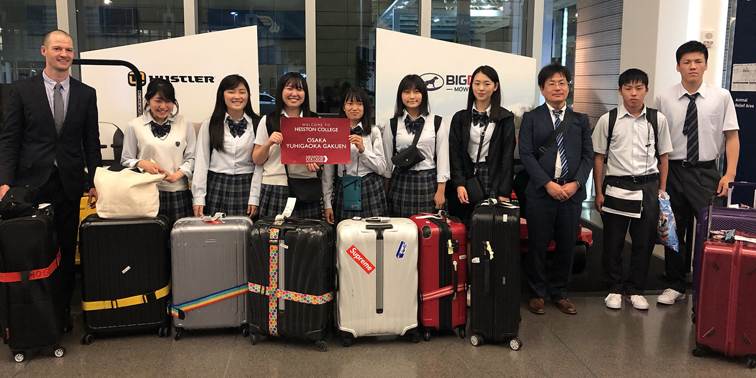 Japanese high school students arrive at Wichita airport on their way to Hesston College