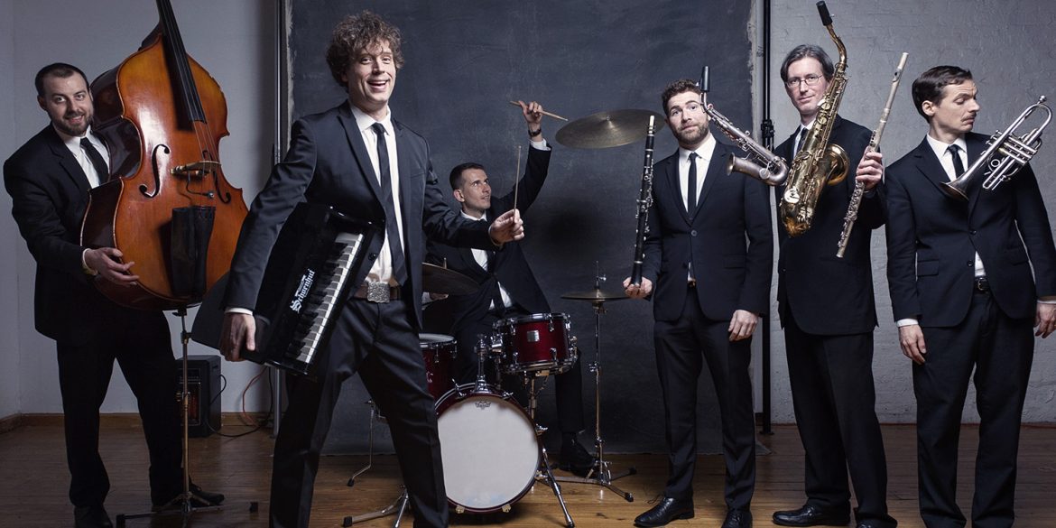 promotional photo of The Queen's Cartoonists musical group