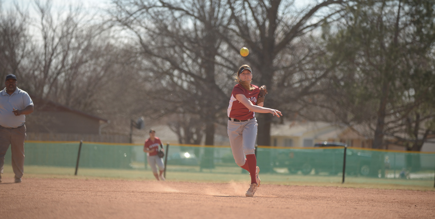 Sierrah Long throws home from her position at shortstop.