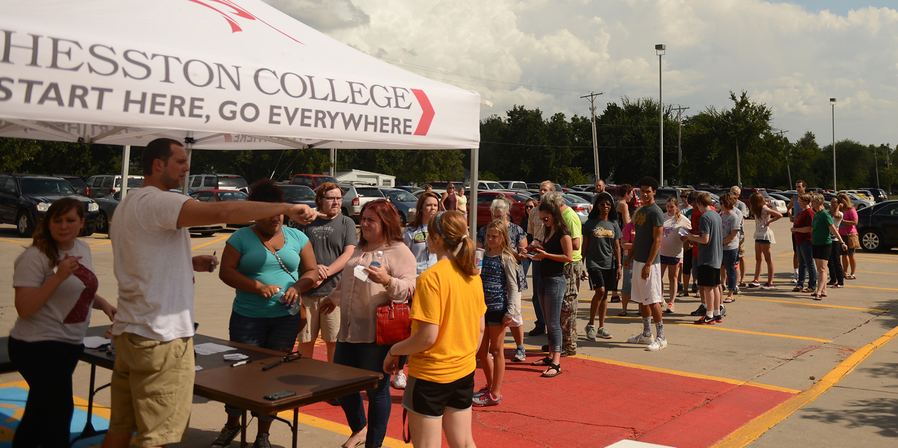 photo - Students and families line up to check in to their residence hall at Hesston College's Opening Weekend 2016.