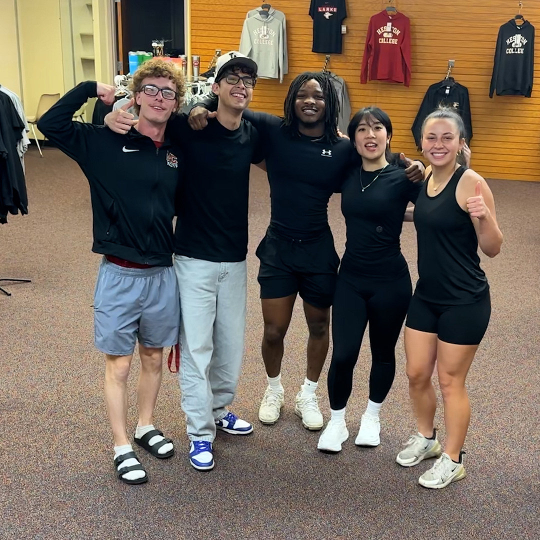 photo - students gathered arm-in-arm in the bookstore