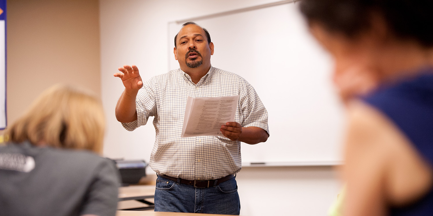 photo - Marvin Lorenzana of Mennonite Mission Network talks to students in Michele Hershberger’s Exploring Ministry class Sept. 10, at Hesston College.
