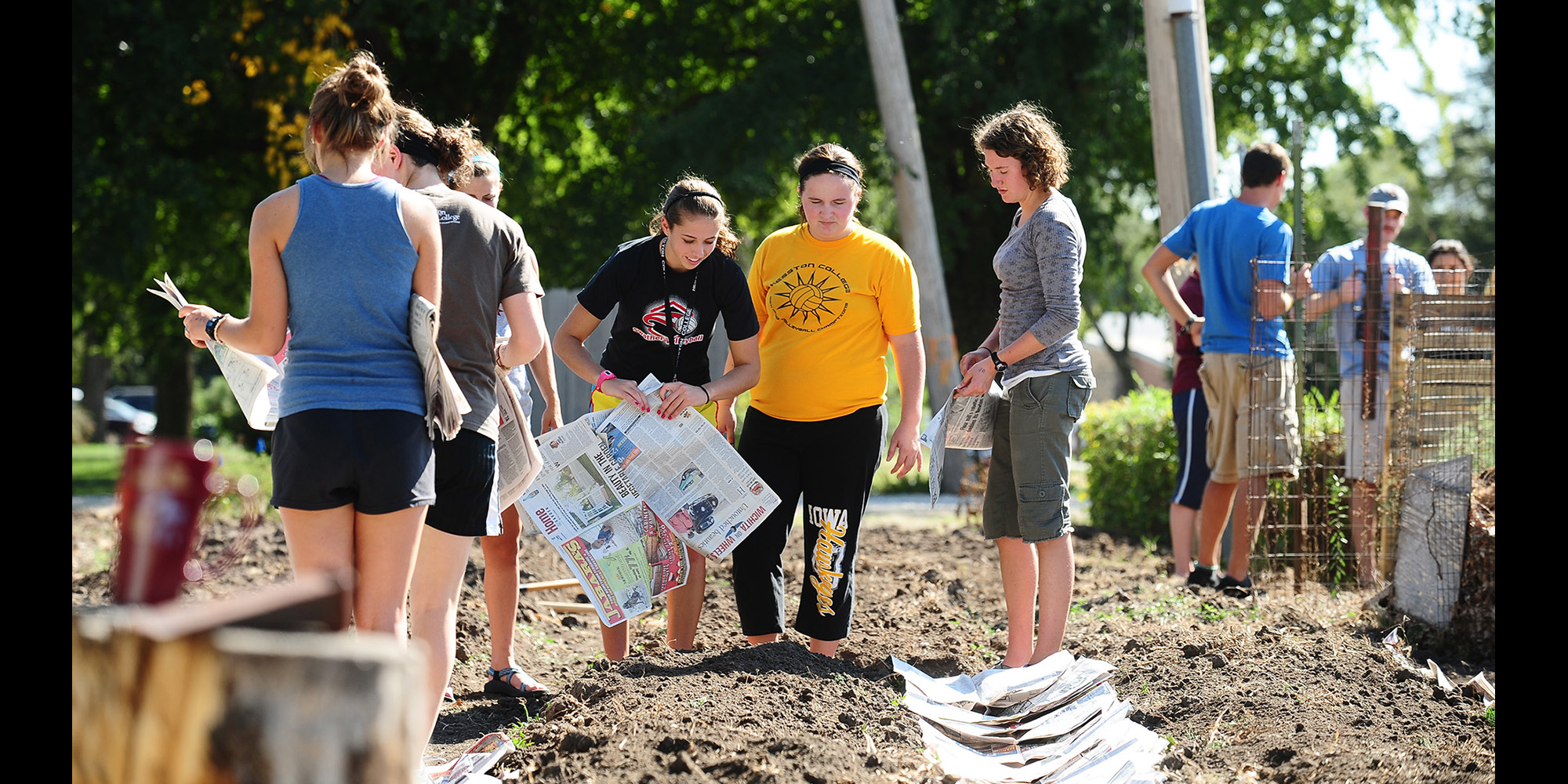photo - Students prepare the Hesston Community Garden for spring planting during No Impact Week Sept. 25 to Oct. 2.