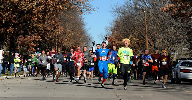 photo - Runners begin the 2012 Howard Hustle
