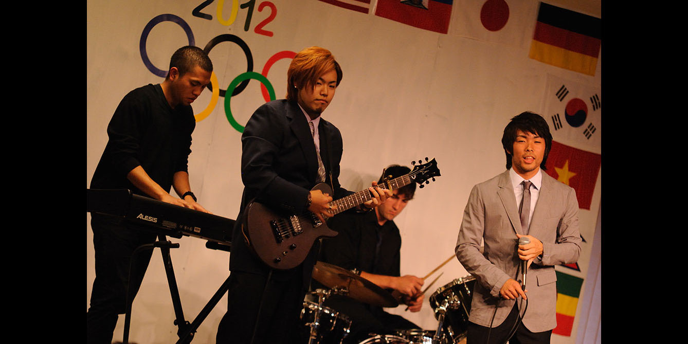 photo - students on stage at Hesston College's International Festival