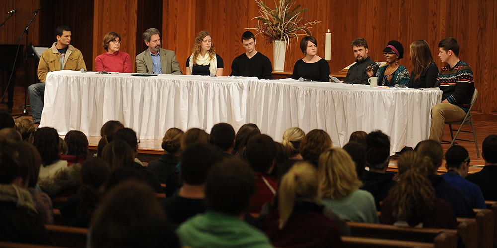 photo - Hesston College sophomore Bonita Garber (Bainbridge, Pa.), third from right, shares during a panel discussion about her experiences and views with gender roles Jan. 16. The panel discussion made up of students and faculty was part of the college’s week-long celebration Jan. 14 to 18 of the life and work of Dr. Martin Luther King, Jr.’s life. The week’s theme, “Gender Around the World and on the Hesston College Campus,” featured author and local college professor Aikiiki Daisy Kabagarama in the keynote presentation Jan. 14. Pictured from left are sophomore Tim Bixler (Indianapolis), biology instructor Lorna Harder, history instructor John Sharp, sophomore Mallory Eicher (Berne, Ind.), sophomore Neal Brubaker (Goessel, Kan.), communication instructor Kendra Burkey, business instructor David LeVan, Garber, education instructor Marissa King and sophomore Matt Hershey (Harleysville, Pa.).