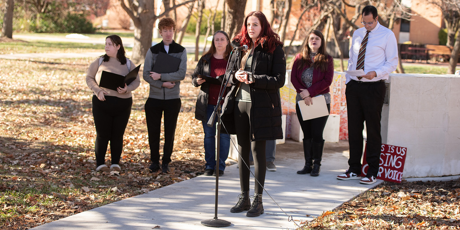 Student speaking at Unity Day gathering.