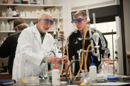 Chemistry faculty member Jim Yoder works with a student.