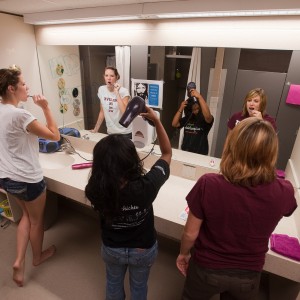 Hesston College students prepare for the day in a recently renovated bathroom in Erb Hall.