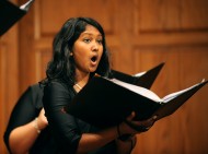 Shawnti Peachey, a member of Hesston's Bel Canto Singers, sings during opening worship.