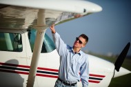 Aviation student Solomon Rudy goes through preflight with one of the college's planes.