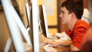 A student works in the Friesen Center Mac lab.