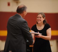 Annali Murray receives her diploma from Hesston College President Howard Keim