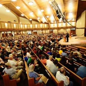 A crowd gathers in Hesston Mennonite Church for homecoming chapel