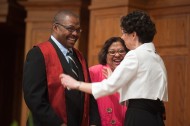 Larry Catlett ’11 receives his stole from Bible and Ministry faculty Michele (Schrock) ’81 Hershberger at Pastoral Ministries Commissioning May 7, as his wife, Carlotta Ponds, looks on.