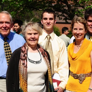 Mark Rombold (center) with his grandparents, Peter and Shirley Rombold (left), and parents, Peter and Marty Rombold (right), following commencement May 8.