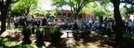 A crowd gathers to dedicate the Freedley Schrock memorial at Hesston College