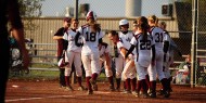 Hesston College softball action photo