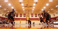 Hesston College men's basketball action photo - Drew Emmert