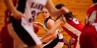 Hesston College women's basketball action photo - Mishaun Pfannenstiel