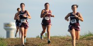 Hesston College women's cross country action photo