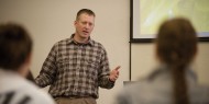 Scott Dorsing ’95 talks about the family business, Royal Ridge Fruit and Cold Storage in Royal City, Wash., with a business class. Several members of the Dorsing family were on campus for two days in January to share their knowledge with business students and the campus community during chapel.