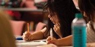 Crisentia Gregor ’14 (Banyuwangi, Indonesia) takes notes during class.