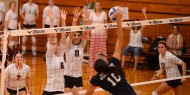 Hesston College volleyball action photo - Desi Newman and Karli Rodriguez