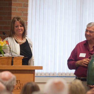 President Howard Keim ’72 and Interim Vice President of Advancement Tonya (Hunsberger) ’94 Detweiler present Doug ’62 and Connie Dorsing with a gift of appreciation for their $1 million gift to the college at the annual Partner Luncheon Sept. 27.
