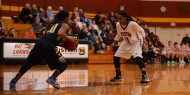 women's basketball action photo - Jermani Thompson