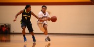 women's basketball action photo - Taelor Drew