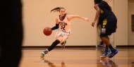 women's basketball action photo - Reagan McClellan