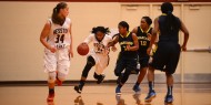 women's basketball action photo - Jermani Thompson