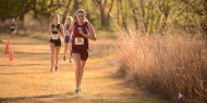 women's cross country action photo - Hannah Heidebrecht