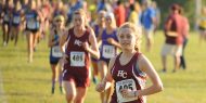 Hesston College women's cross country action photo - Sierra Broce