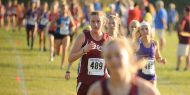 Hesston College women's cross country action photo - Sadie Winter