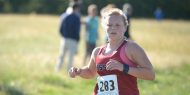 Hesston College women's cross country action photo - Kate Kilmer at the Bethel College meet, Oct. 7, 2017