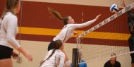 Hesston College volleyball action photo - Samantha Rossin spikes in a match with Cloud County CC, Oct. 6, 2017