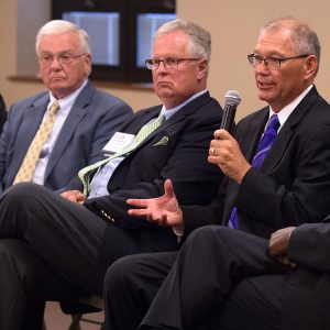 Former Hesston College presidents Laban Peachey, Kirk Alliman and Howard Keim visit with new president Joe Manickam
