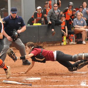 Catcher Ally Steiner couldn't quite tag the Neosho runner as the Larks fell in the playoffs.