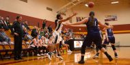 Hesston College women's basketball action photo - Millaya Bray