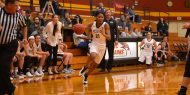 Hesston College women's basketball action photo - Millaya Bray