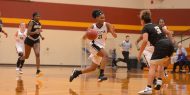 Hesston College women's basketball action photo - Millaya Bray