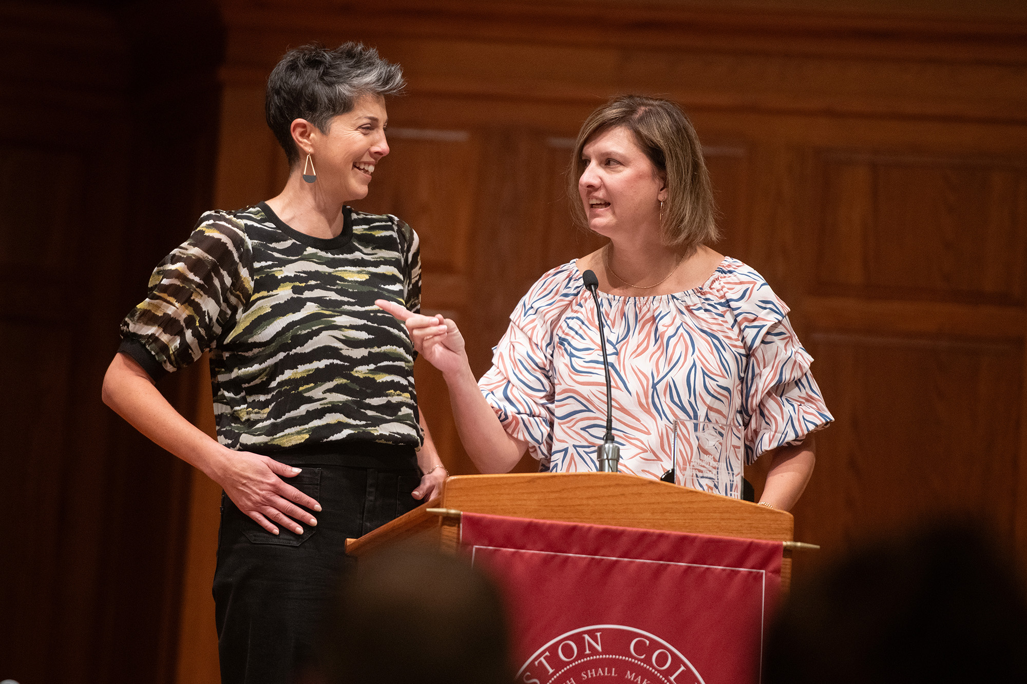 2024 Homecoming - Lark Hall of Fame induction ceremony - 1996-97 women's basketball team members Shanna (Roth) Heinz and Lisa (Schmidt) Graber introduce their coach, inductee Joel Kauffman