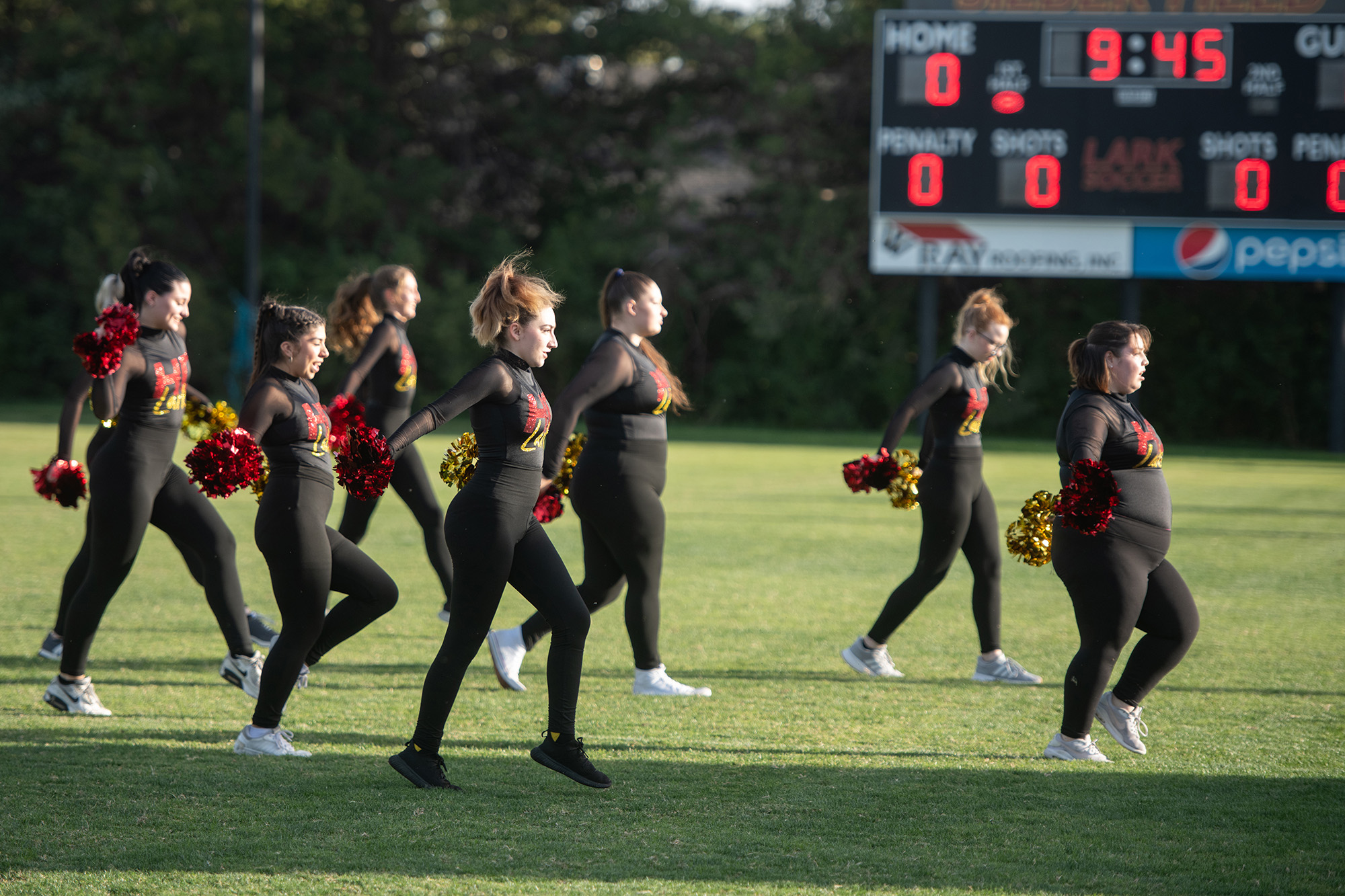 Homecoming 2024 family festival - dance team performing with Clark the Lark